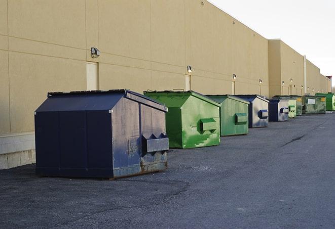 overhead shot of filled construction dumpsters in Alachua